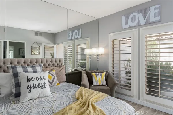 a view of a livingroom with furniture and wooden floor