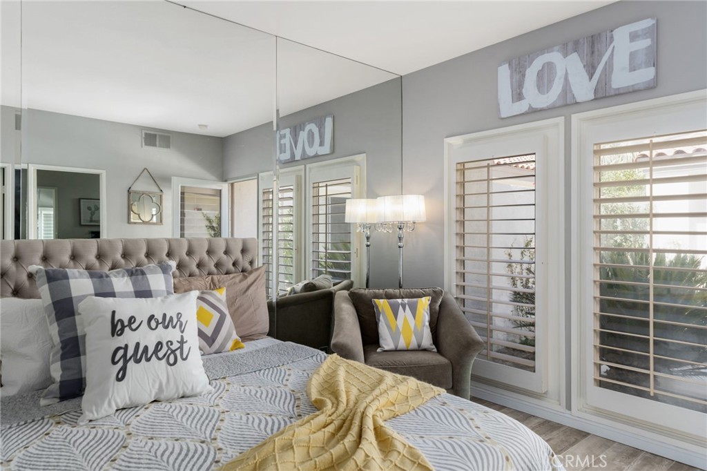 56980 Merion La Quinta, CA 92253 - Photo 38 of 51 a view of a livingroom with furniture and wooden floor