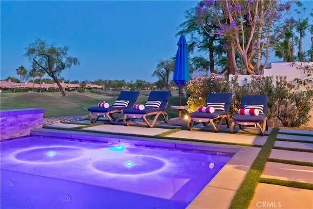 a view of a chairs and tables in patio