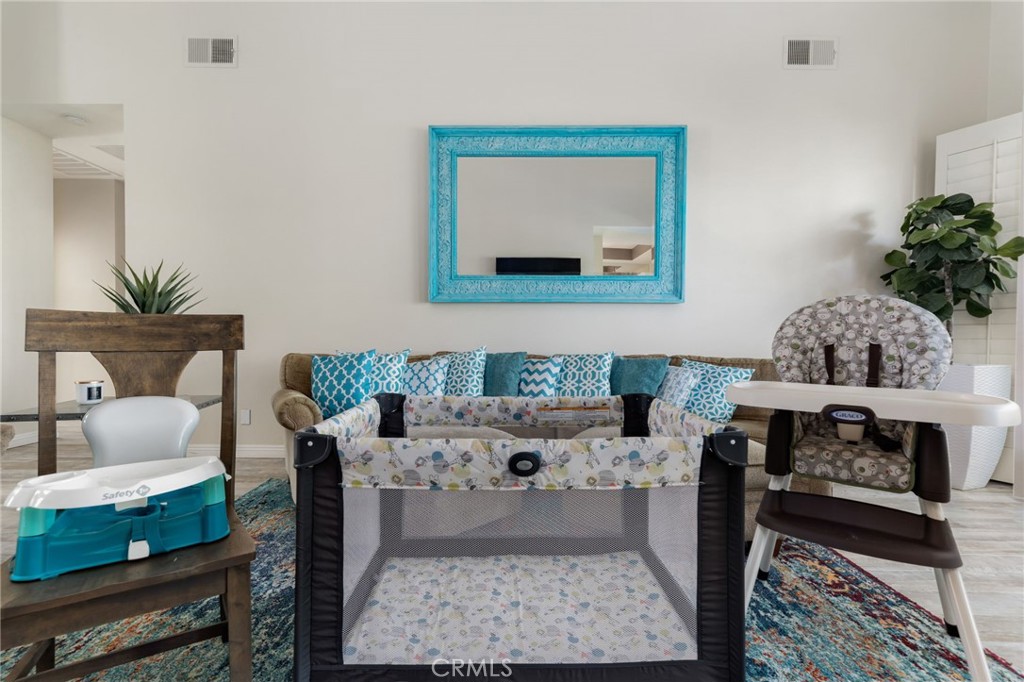 56980 Merion La Quinta, CA 92253 - Photo 43 of 51 a living room with furniture and a fireplace