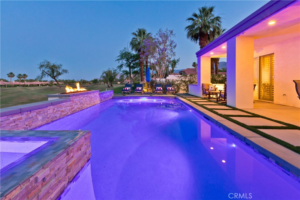 56980 Merion La Quinta, CA 92253 - Photo 49 of 51 a swimming pool with outdoor seating and yard