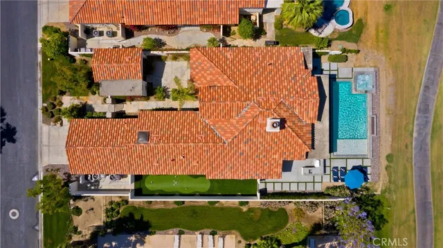 an aerial view of a houses with outdoor space