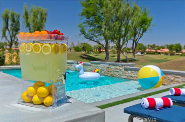 a view of a room with shelves and entertaining space