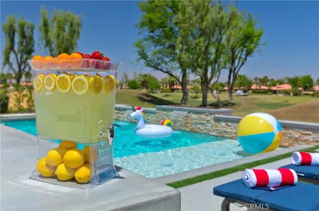 a view of a room with shelves and entertaining space