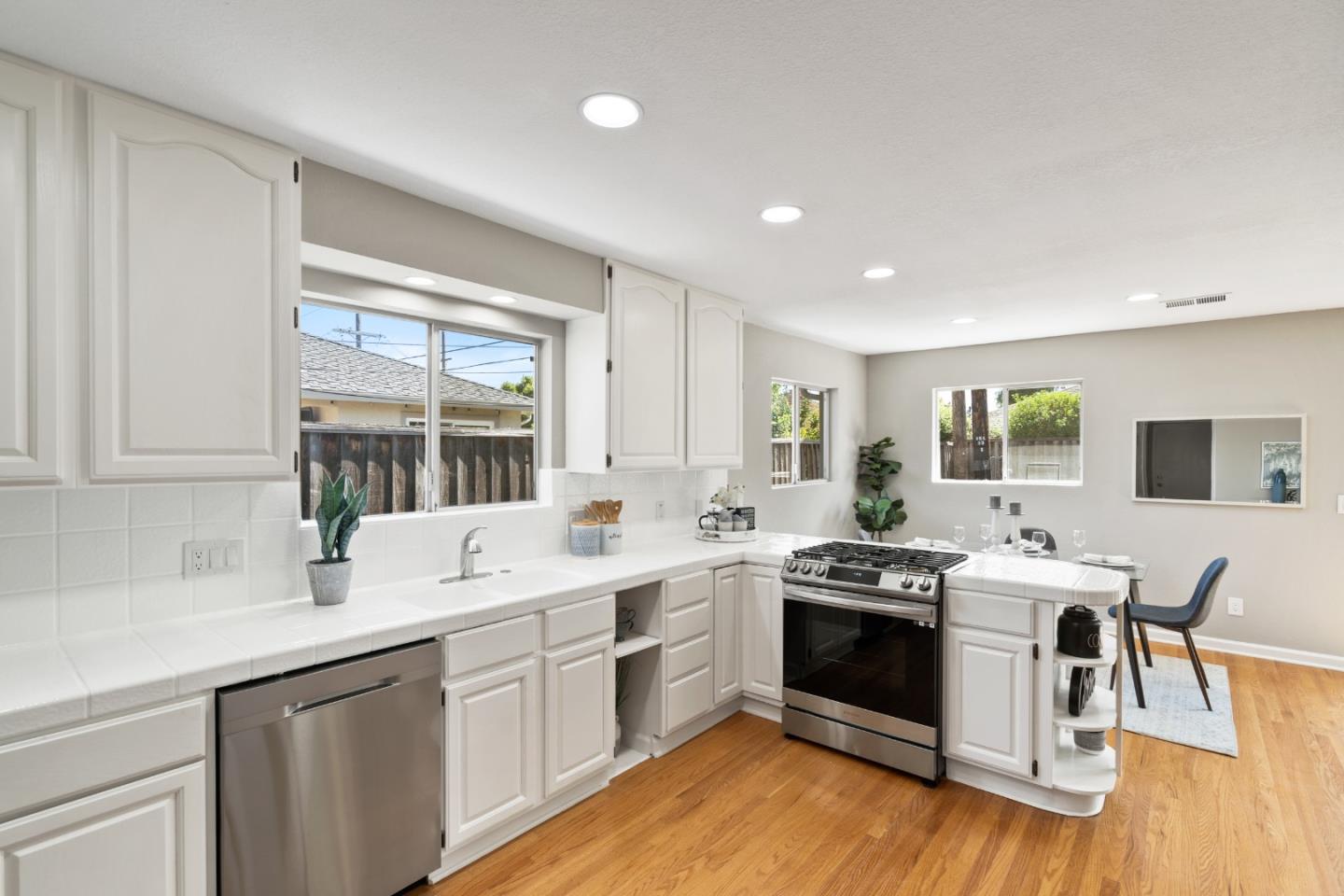 762 Armanini Avenue Santa Clara, CA 95050 - Photo 12 of 43 a kitchen with appliances a sink and cabinets