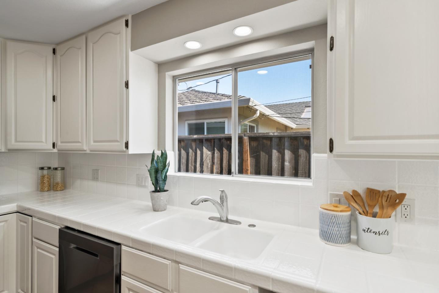762 Armanini Avenue Santa Clara, CA 95050 - Photo 13 of 43 a kitchen with a sink and a window