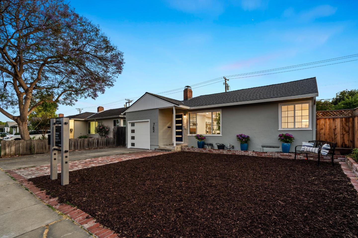 762 Armanini Avenue Santa Clara, CA 95050 - Photo 31 of 43 a front view of house with yard and trees in the background