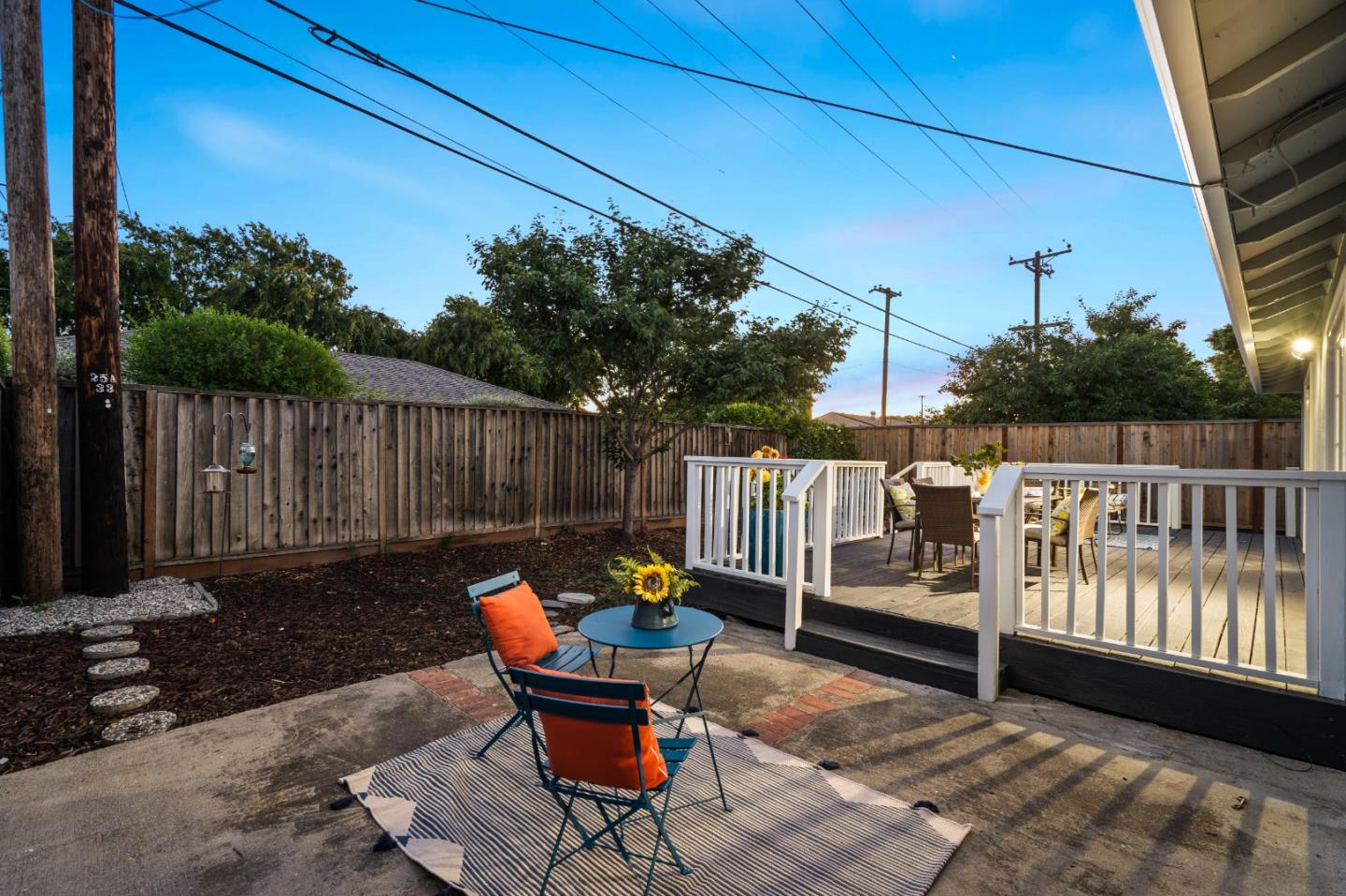 762 Armanini Avenue Santa Clara, CA 95050 - Photo 34 of 43 a balcony with chairs and wooden fence