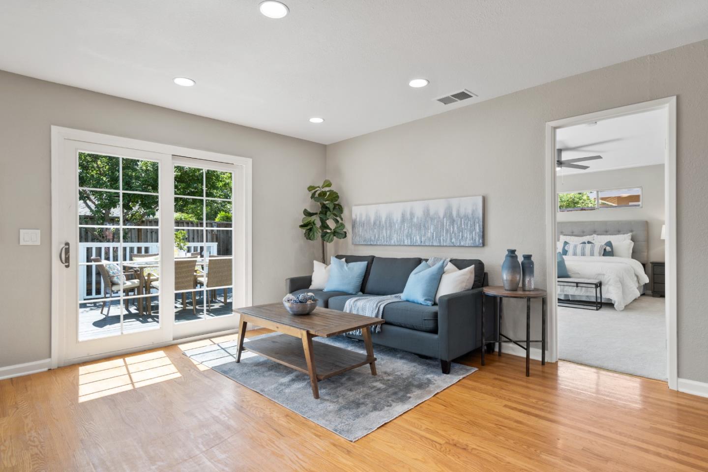 762 Armanini Avenue Santa Clara, CA 95050 - Photo 8 of 43 a living room with furniture and a large window