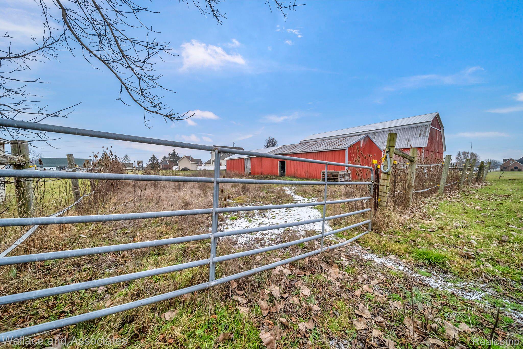 5070 Walker Road North Street, MI 48049 - Photo 66 of 71 Horse corral off hay barn