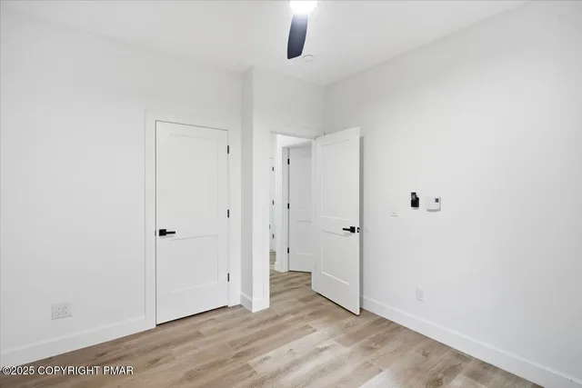 a bathroom with a shower and a toilet