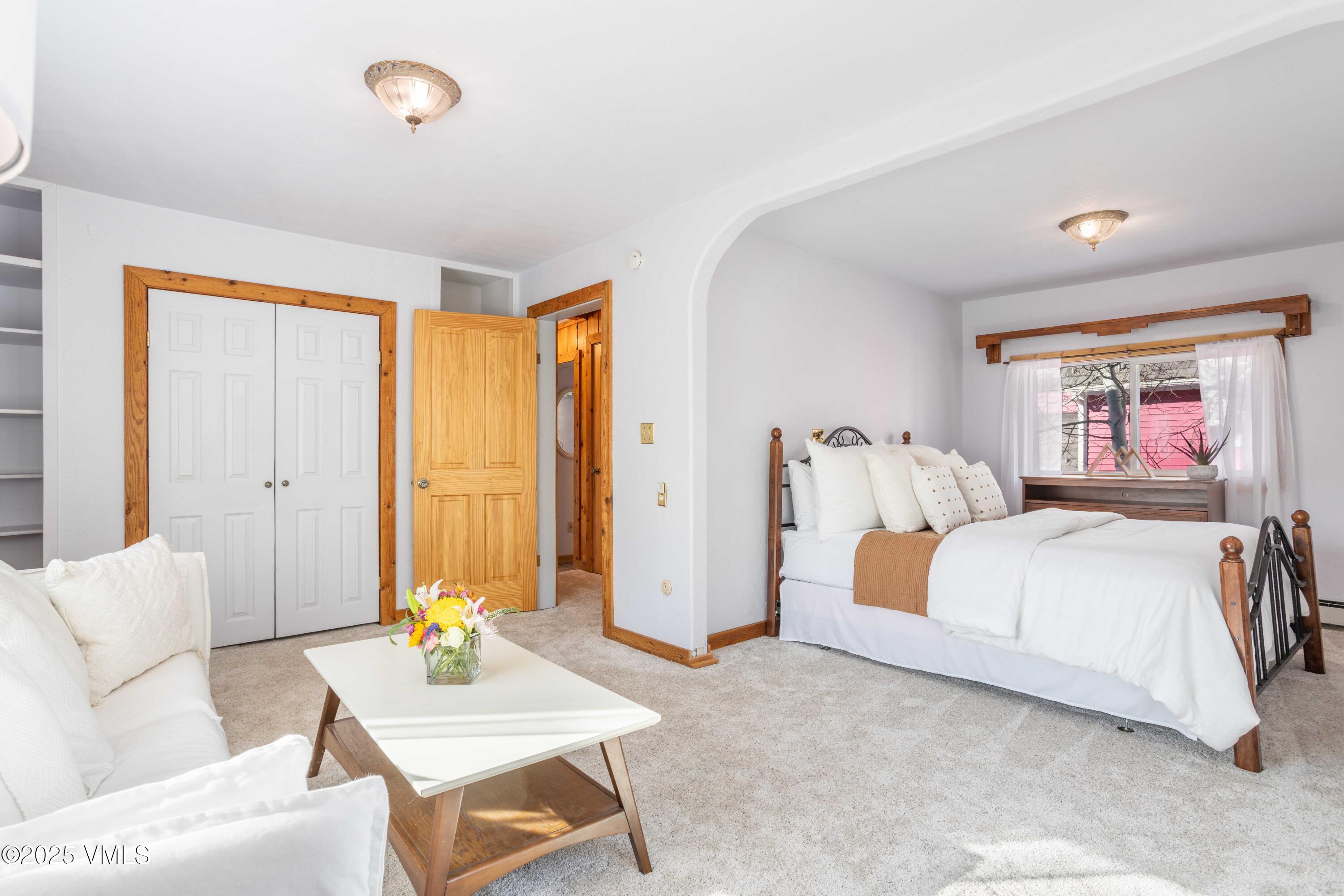 561 Main Street Minturn, CO 81645 - Photo 11 of 29 a bedroom with a bed and window