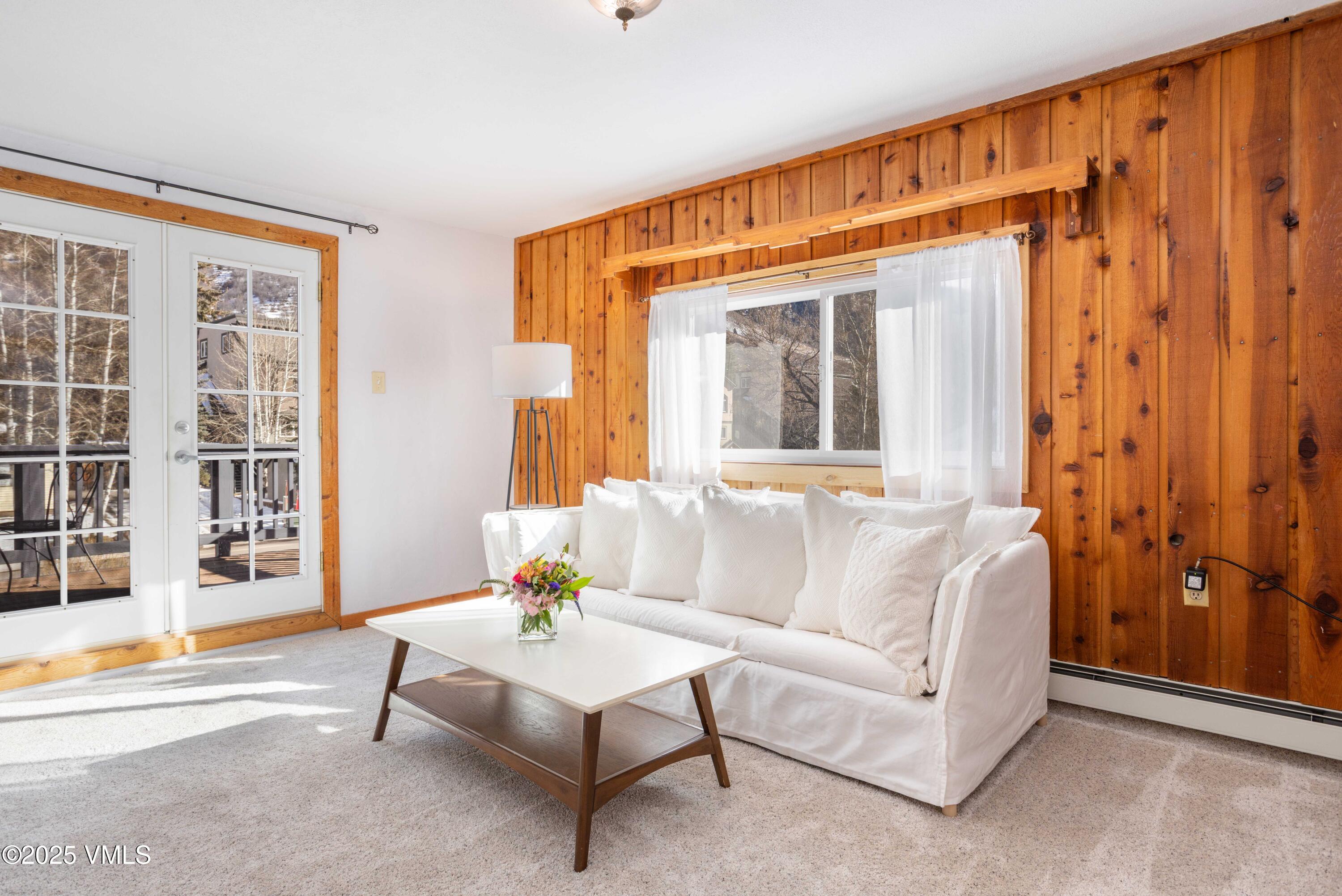 561 Main Street Minturn, CO 81645 - Photo 12 of 29 a living room with furniture and a large window