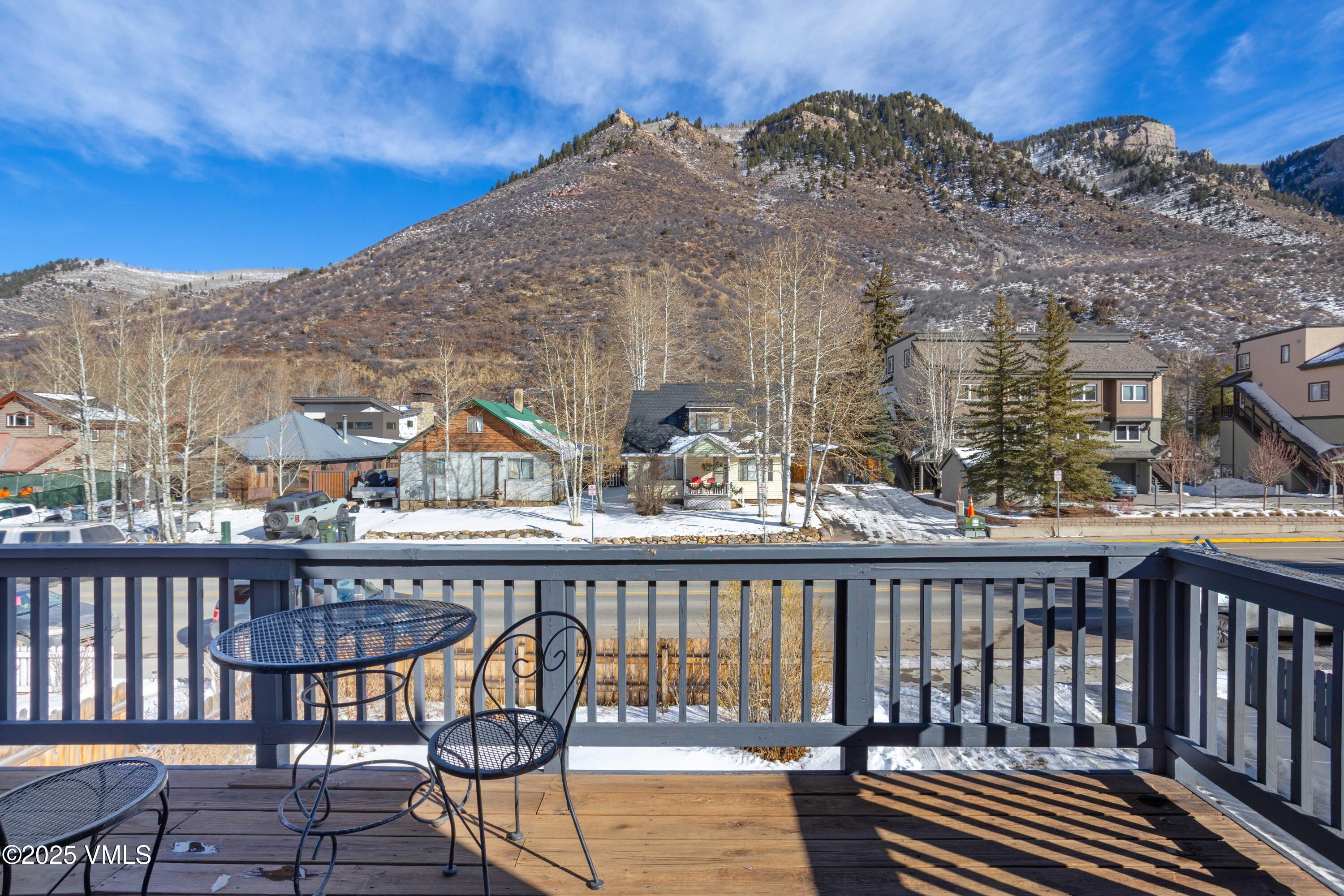 561 Main Street Minturn, CO 81645 - Photo 13 of 29 a view of a brick building from a balcony