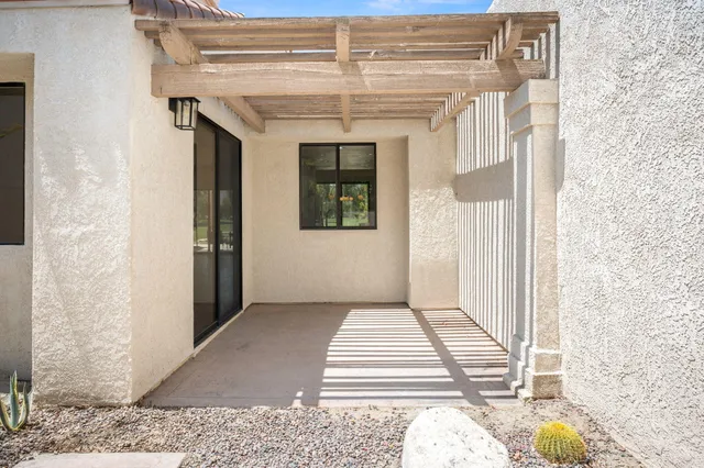 a front view of a house with a porch