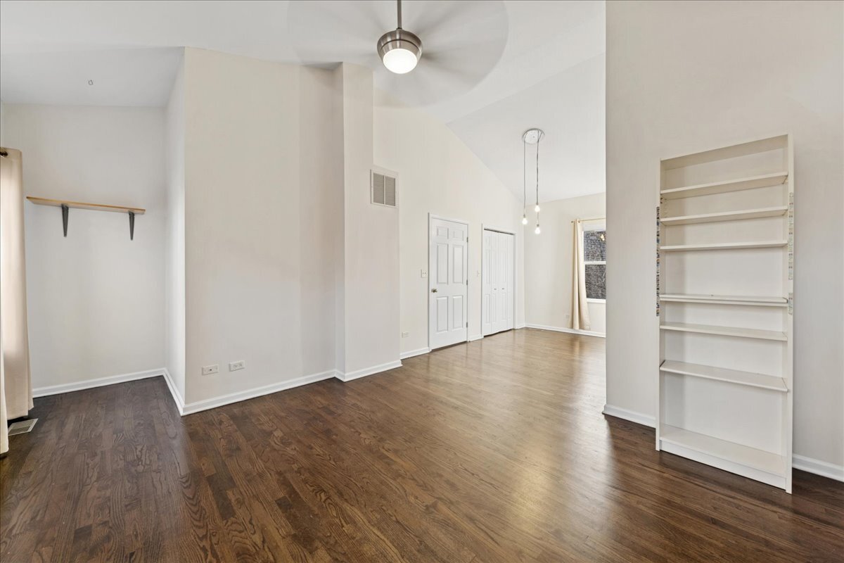 648 North Bishop Street, Unit S Chicago, IL 60642 - Photo 12 of 23 a view of empty room with wooden floor