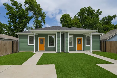 front view of a house and a yard