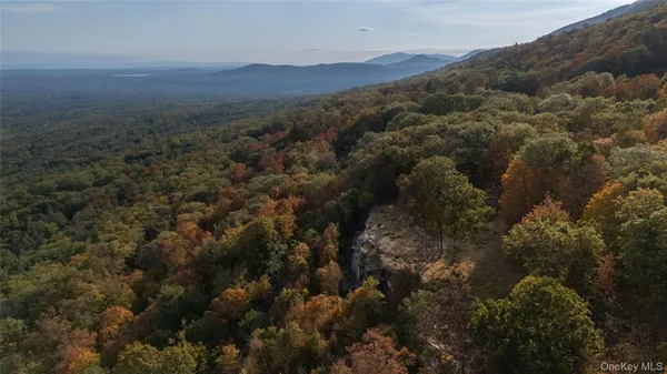 an aerial view of residential house and green space