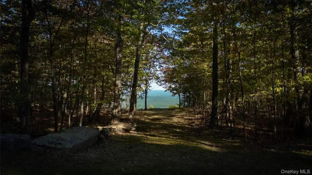 a view of a street with a building in the background