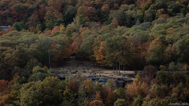 an aerial view of house with yard