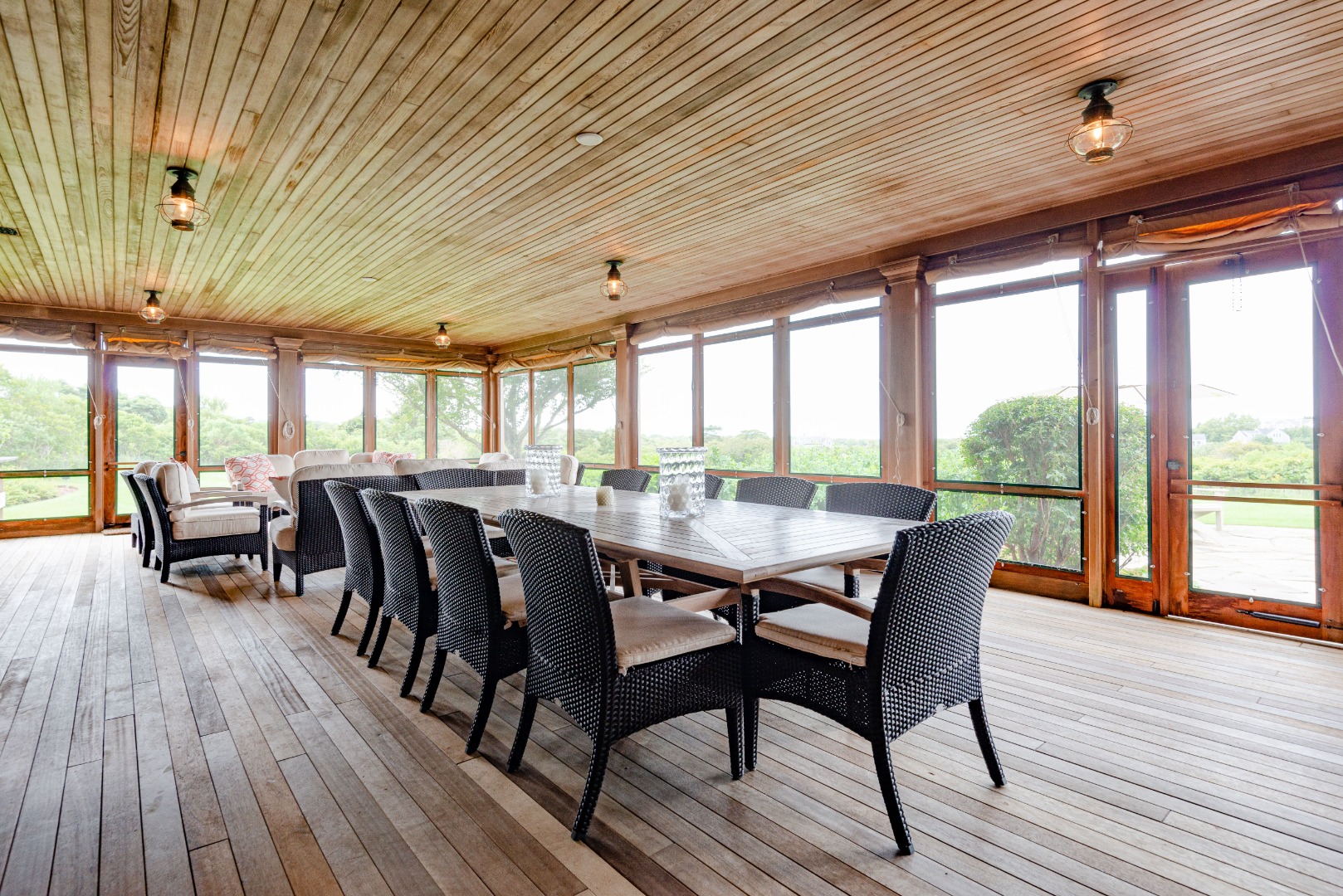 183 Polpis Road Nantucket, MA 02554 - Photo 38 of 62 a dining room with furniture and wooden floor