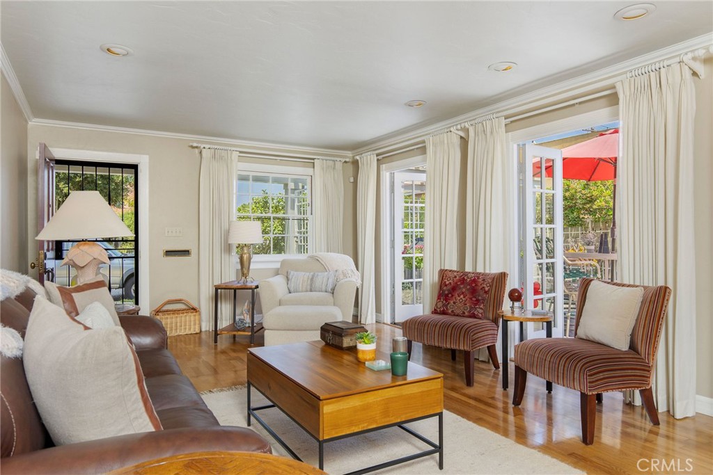 4124 East 5th Street Long Beach, CA 90814 - Photo 13 of 38 a living room with furniture and a large window