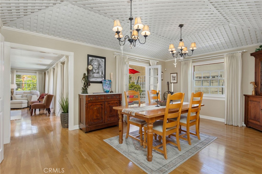 4124 East 5th Street Long Beach, CA 90814 - Photo 15 of 38 a view of a dining room with furniture and wooden floor