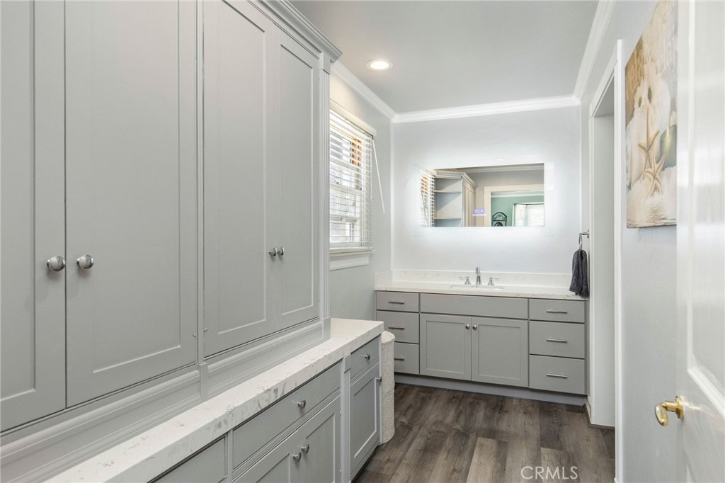 4124 East 5th Street Long Beach, CA 90814 - Photo 21 of 38 a bathroom with a double vanity sink toilet and shower