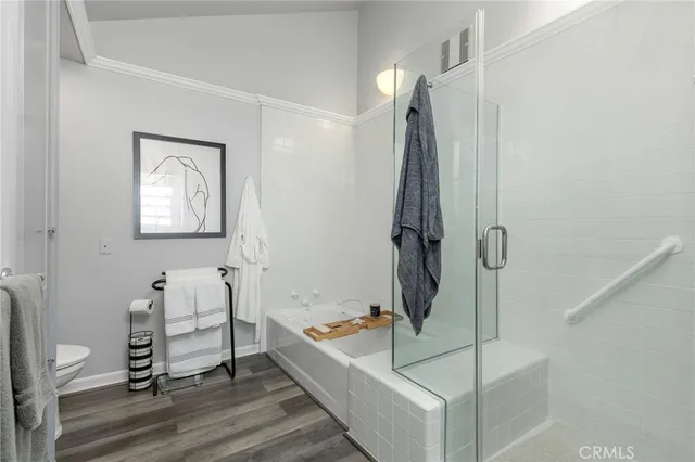 a bathroom with a tub and shower