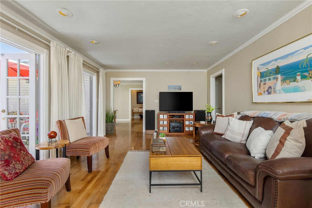 4124 East 5th Street Long Beach, CA 90814 - Photo 10 of 38 a living room with furniture and a flat screen tv