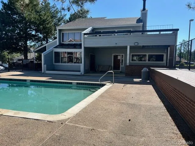 a view of a house with a swimming pool