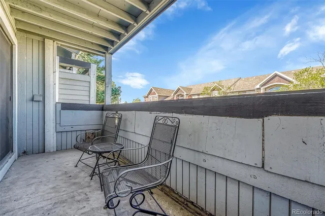 a view of a terrace with chair and table