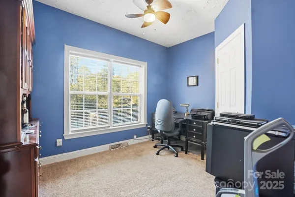 a workspace with chandelier