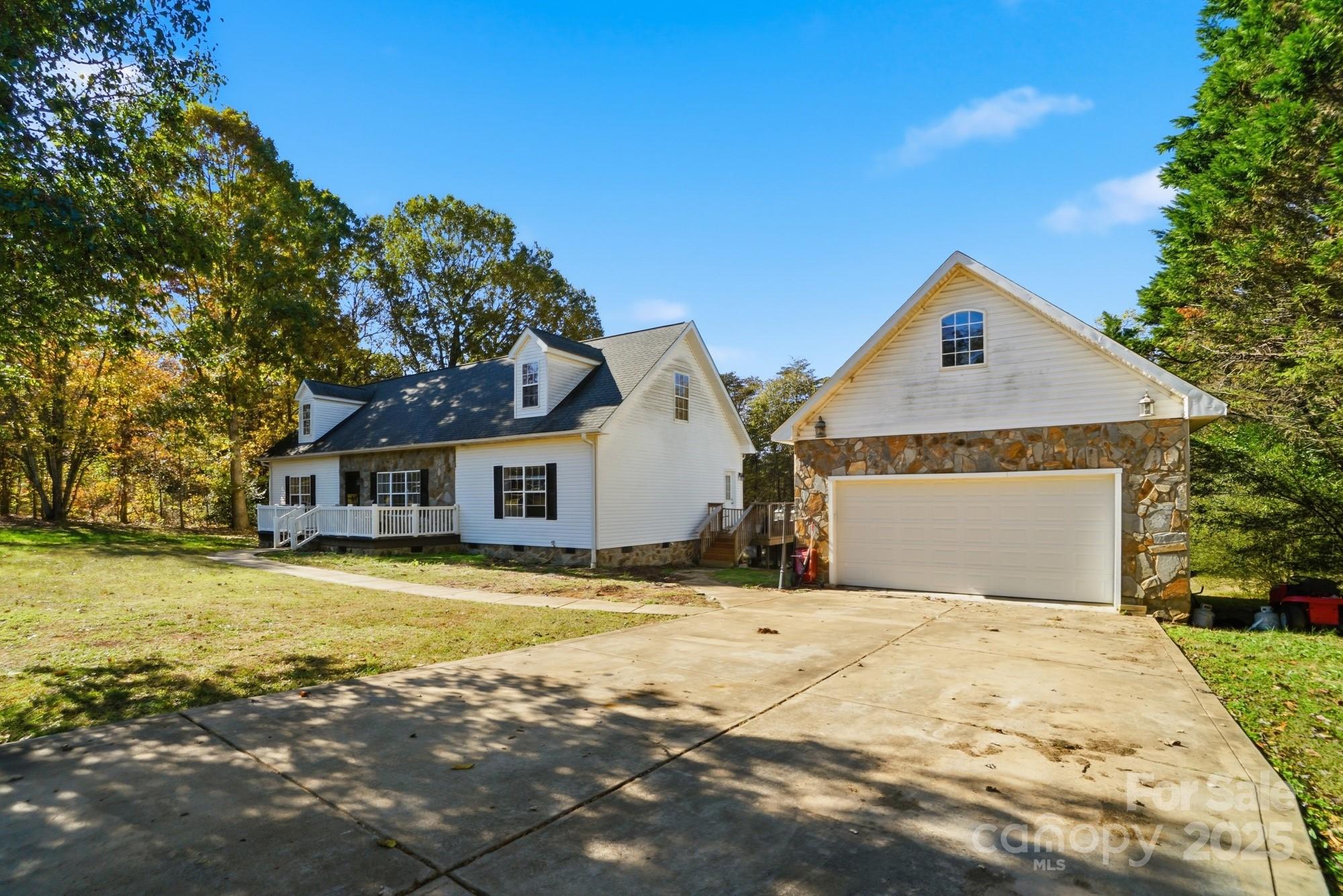 218 Fulbright Road Stony Point, NC 28678 - Photo 3 of 47 a front view of a house with a yard