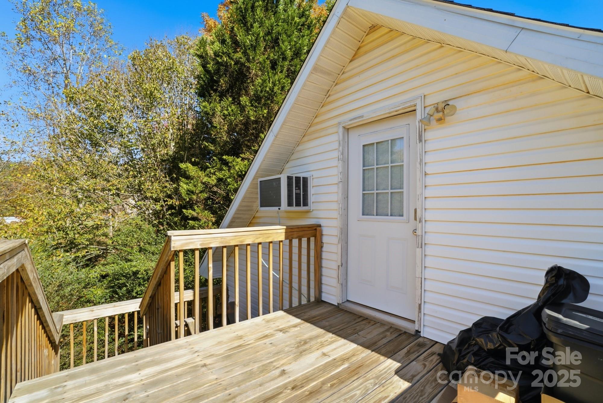 218 Fulbright Road Stony Point, NC 28678 - Photo 39 of 47 a view of a wooden deck and a backyard