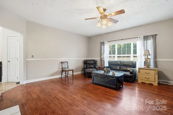 a living room with furniture and window