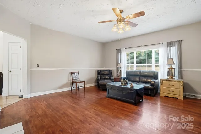 a living room with furniture and window