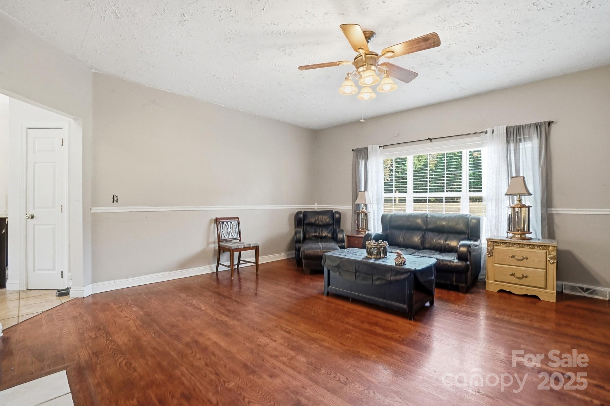 218 Fulbright Road Stony Point, NC 28678 - Photo 8 of 47 a living room with furniture and window