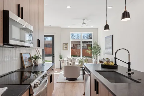 a kitchen with a stove and a sink