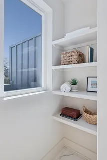 a view of an empty walk in closet