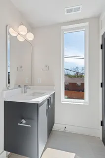 a view of balcony with wooden floor