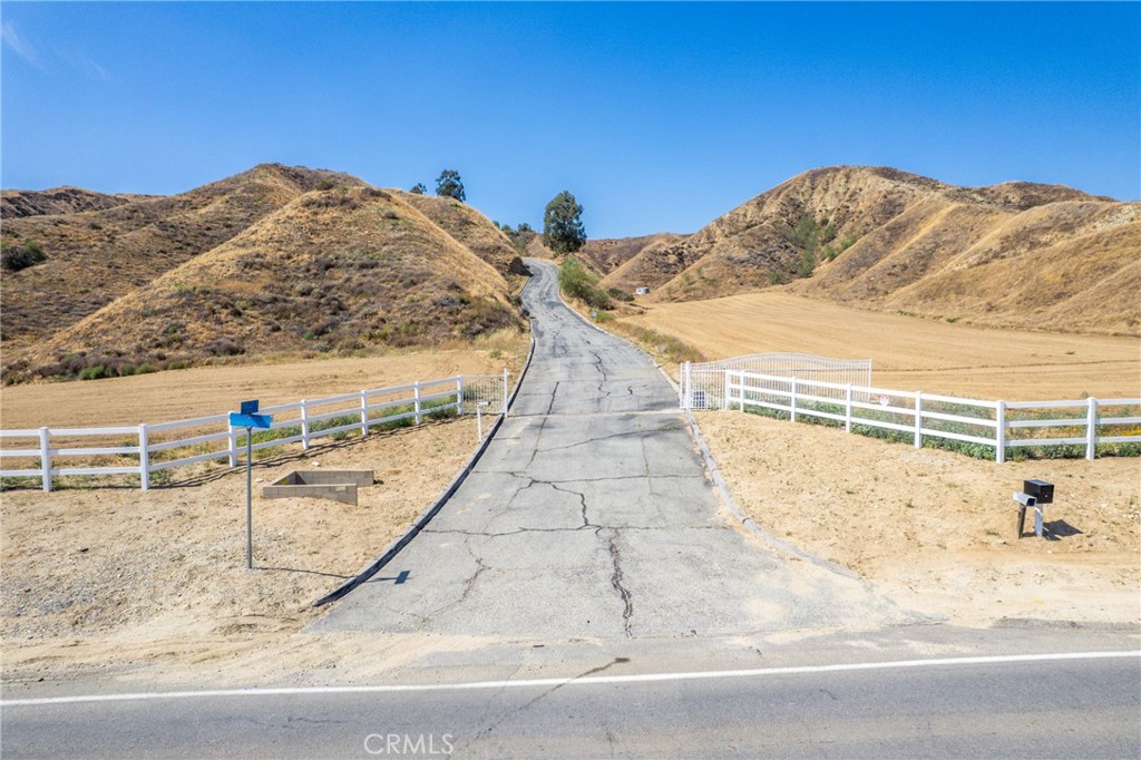 13280 Revello Road Redlands, CA 92373 - Photo 5 of 37 a view of a swimming pool with an ocean view