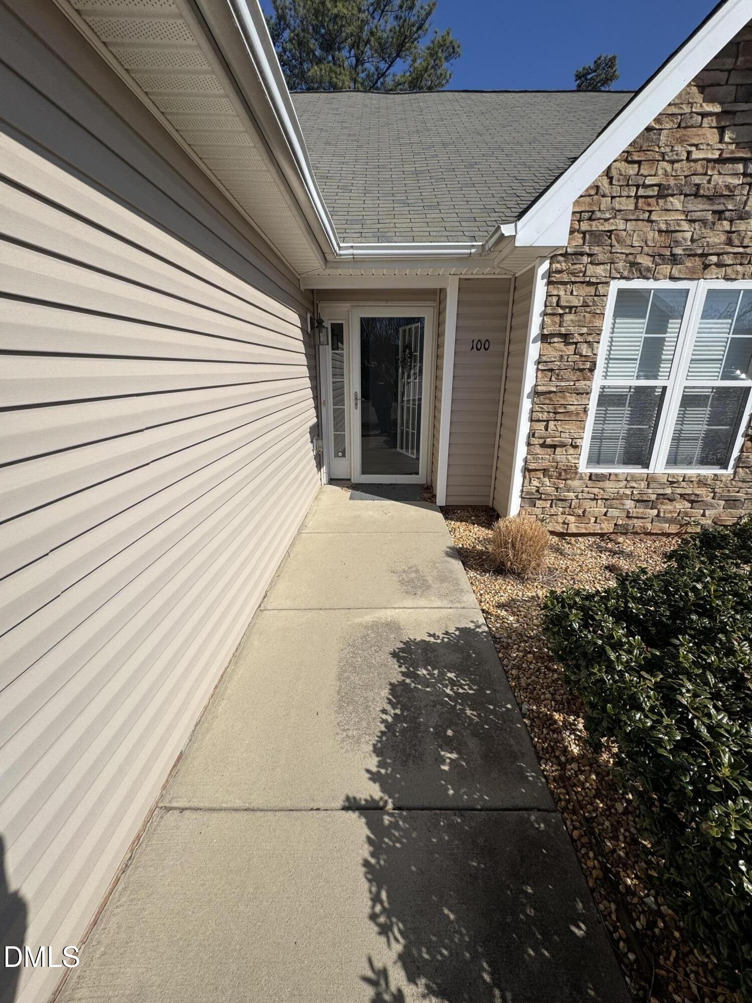 11351 Clubhaven Place, Unit 100 Raleigh, NC 27617 - Photo 3 of 29 a view of a house with a door