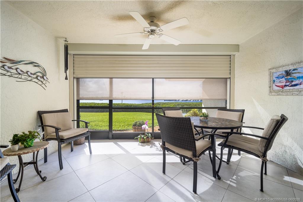 3100 Southeast Pruitt Road, Unit F101 Port St. Lucie, FL 34952 - Photo 6 of 37 Remote shutters and roll down shades
