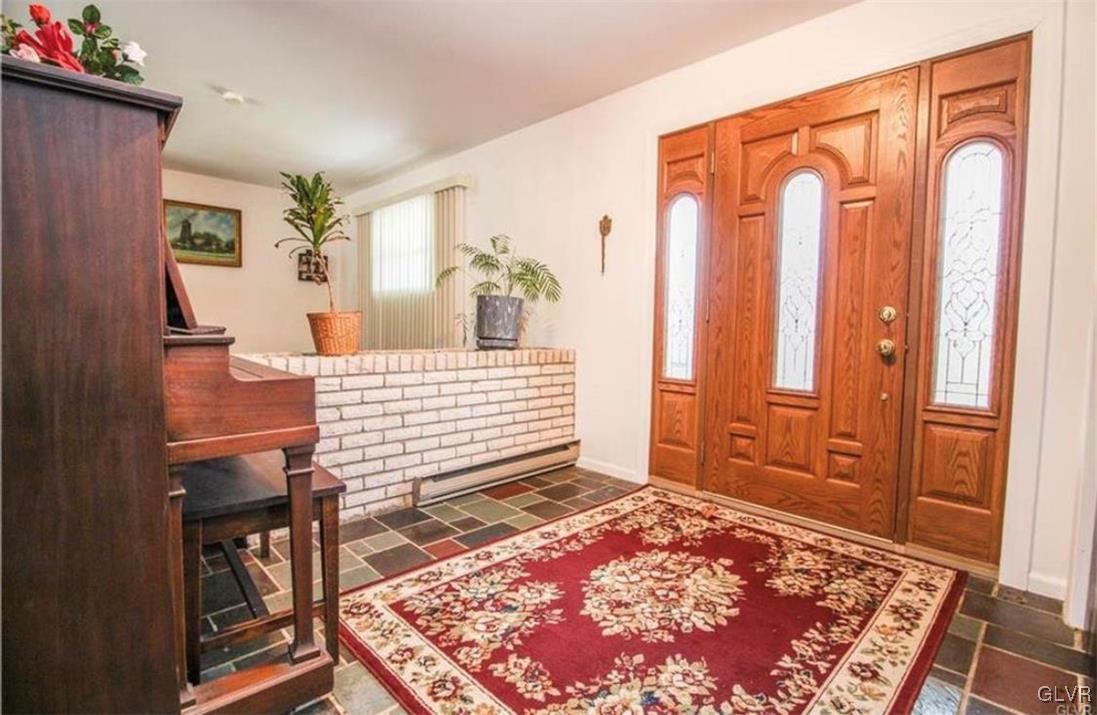 487 Willow Road Walnutport, PA 18088 - Photo 9 of 49 first floor entranceway with flagstone floor with