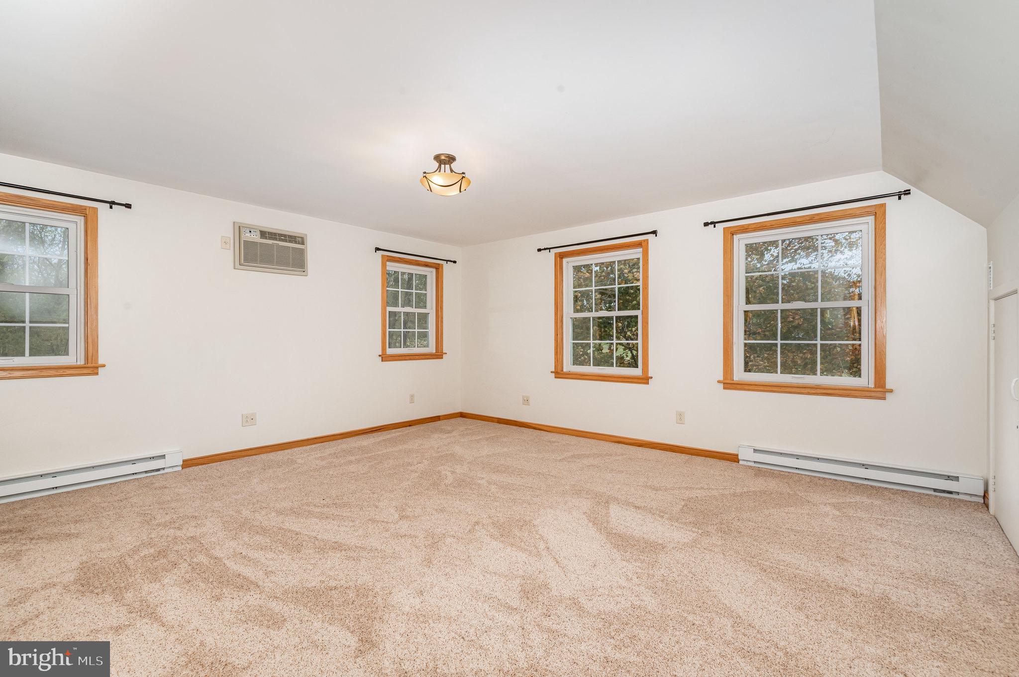 2091 Stumpstown Road Mechanicsburg, PA 17055 - Photo 16 of 52 an empty room with windows