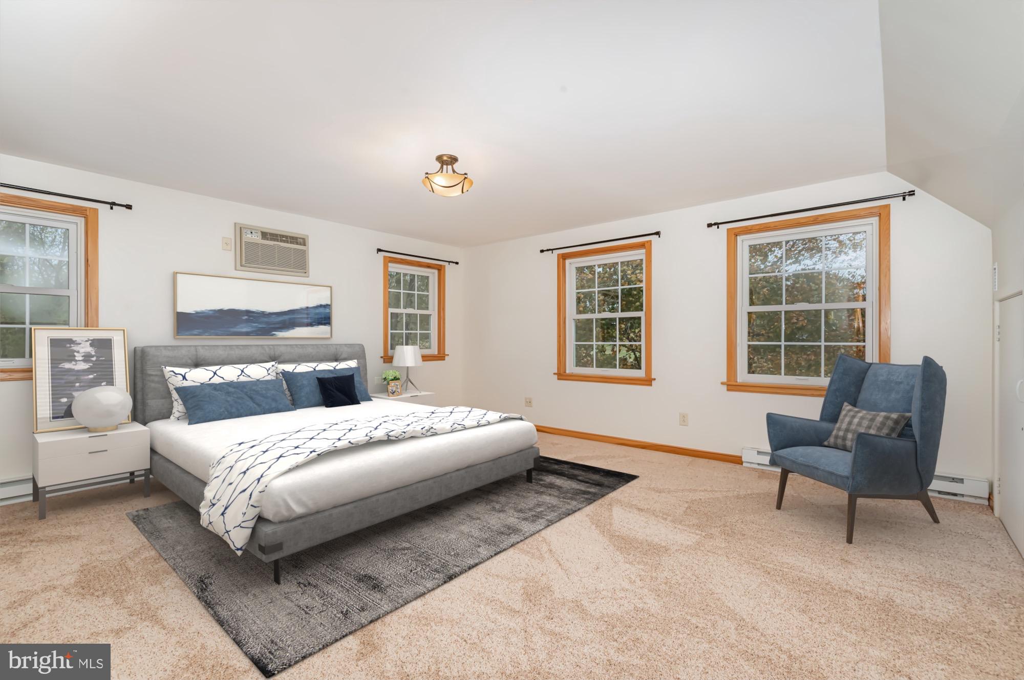 2091 Stumpstown Road Mechanicsburg, PA 17055 - Photo 17 of 52 a bedroom with a bed and a chair
