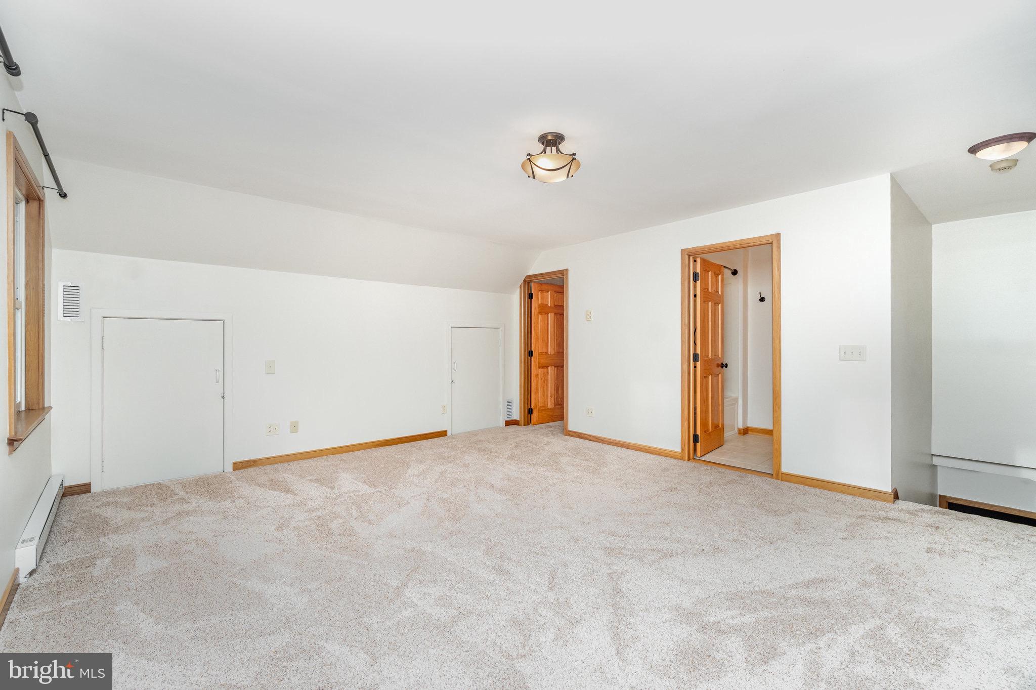 2091 Stumpstown Road Mechanicsburg, PA 17055 - Photo 18 of 52 a view of an empty room with a window
