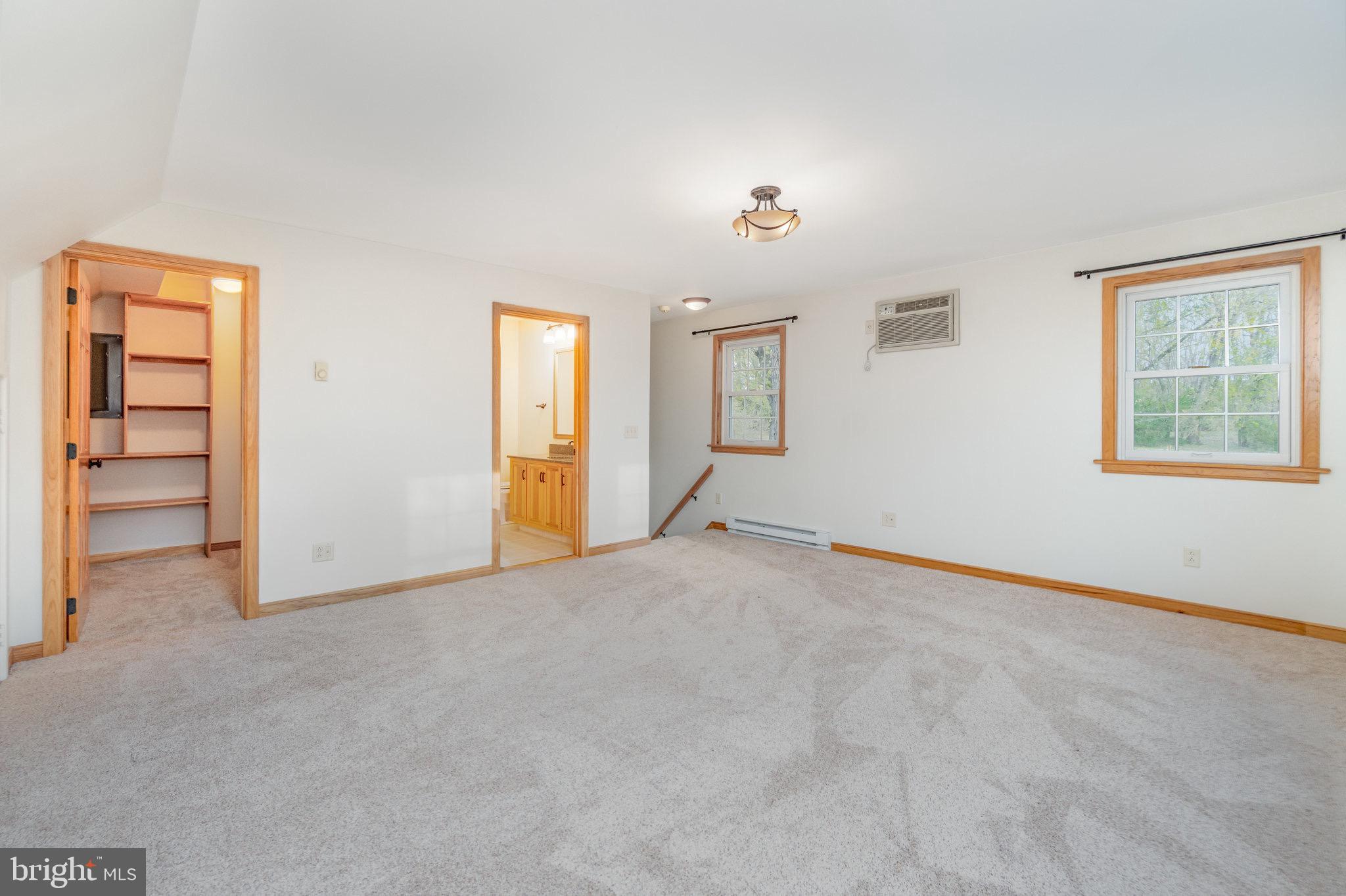 2091 Stumpstown Road Mechanicsburg, PA 17055 - Photo 19 of 52 an empty room with windows and closet