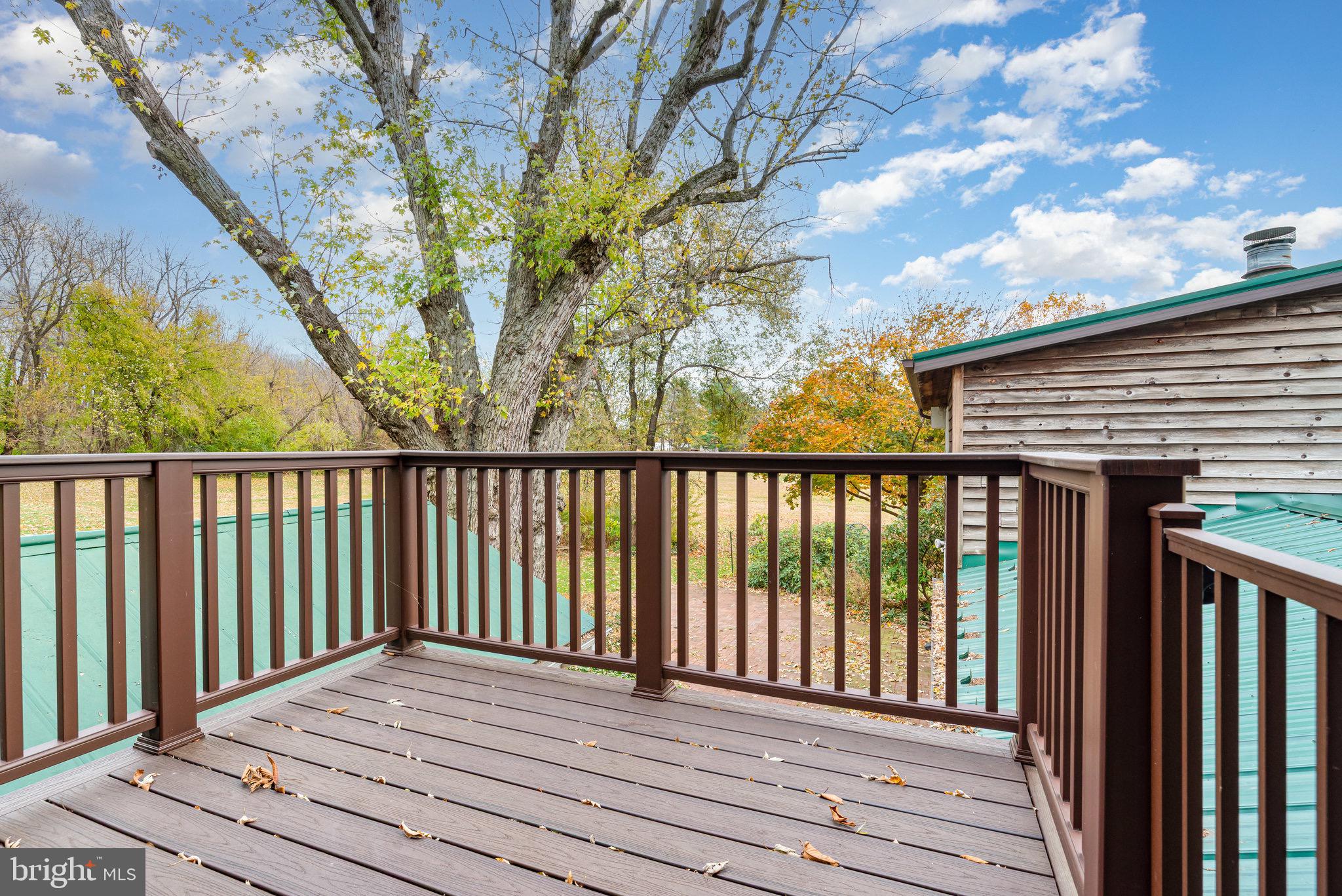 2091 Stumpstown Road Mechanicsburg, PA 17055 - Photo 25 of 52 a balcony with wooden floor and fence